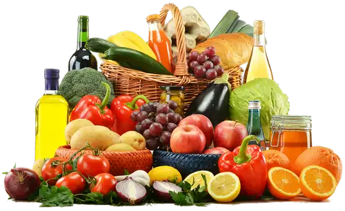 Ein Korb mit Obst und Gemüse und vielen Ölen